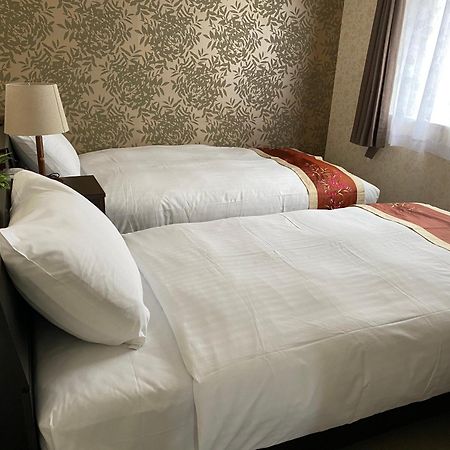 Ocean Front Sumuide Apartment Nago Bagian luar foto