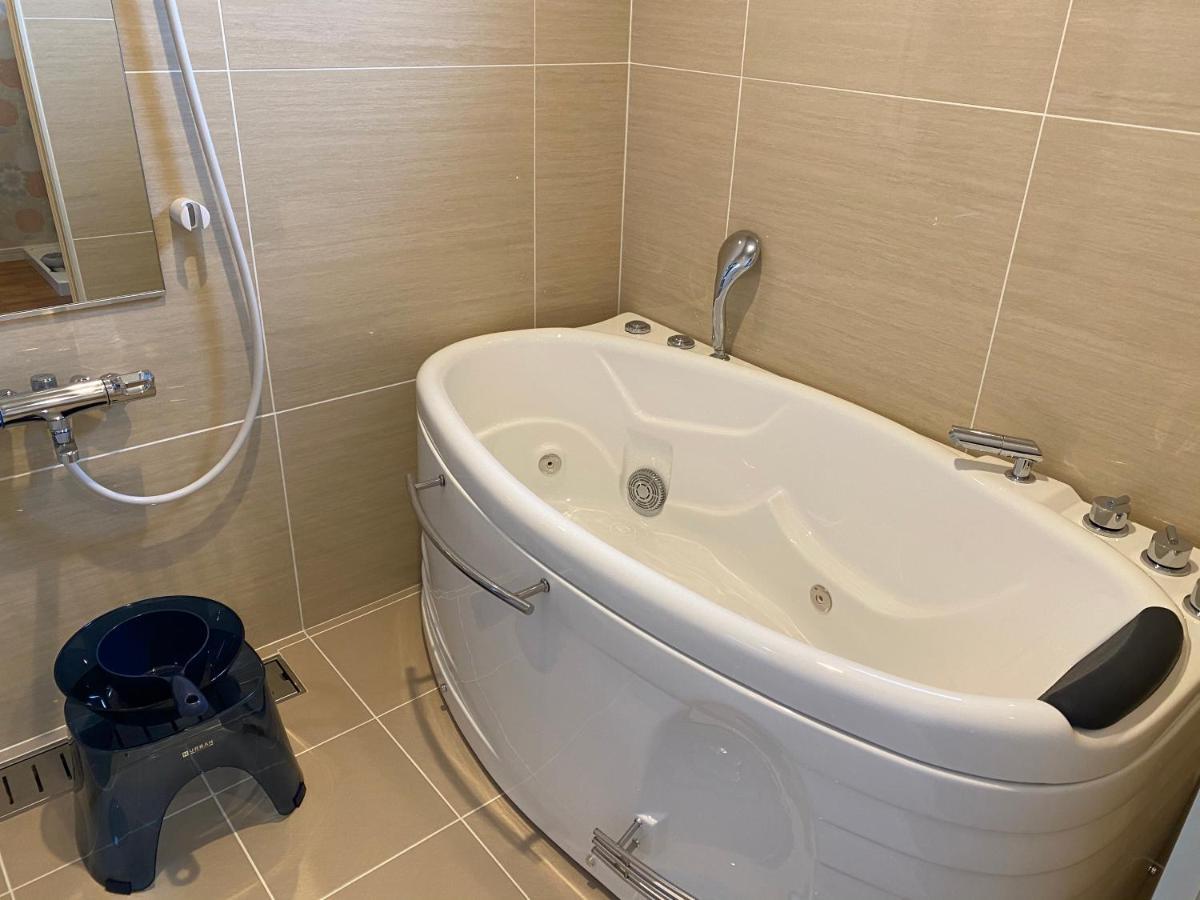 Ocean Front Sumuide Apartment Nago Bagian luar foto