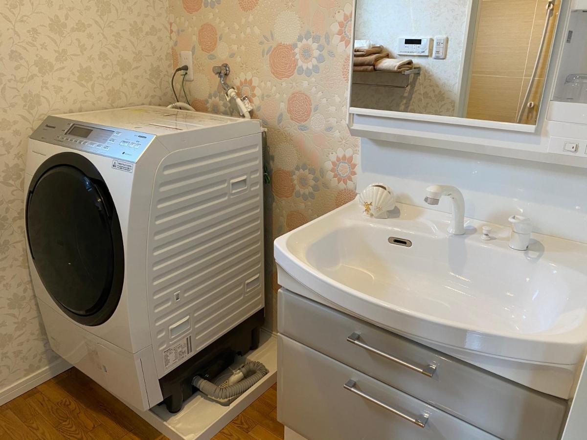 Ocean Front Sumuide Apartment Nago Bagian luar foto