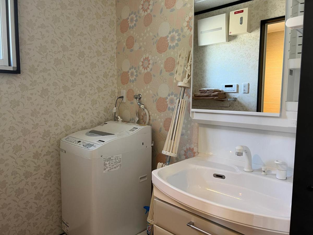 Ocean Front Sumuide Apartment Nago Bagian luar foto
