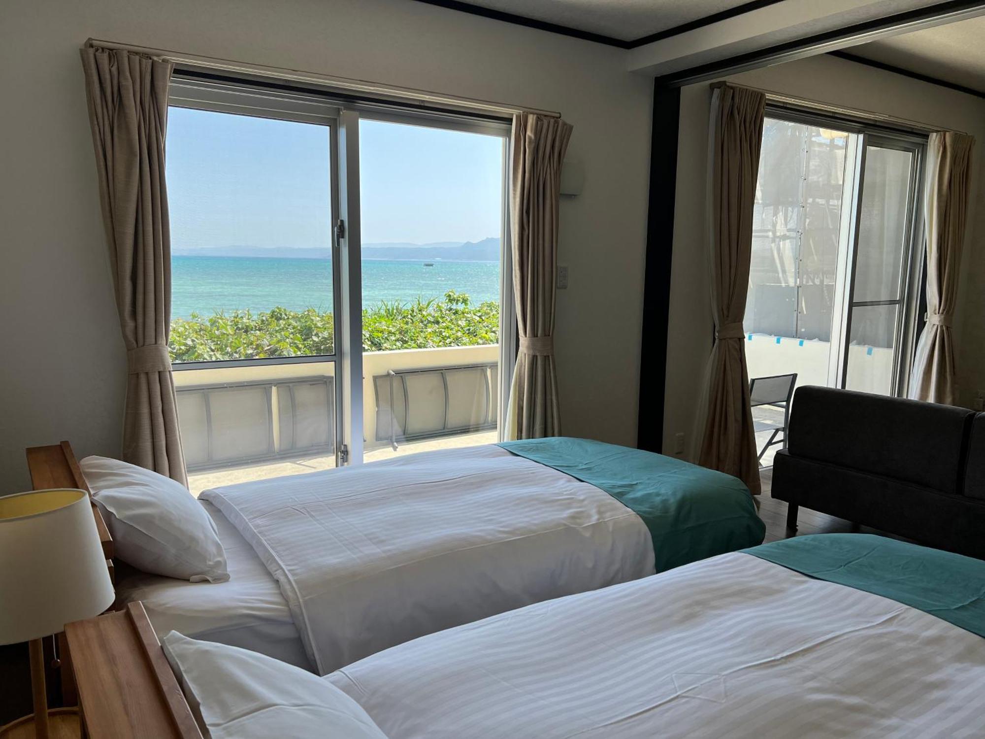 Ocean Front Sumuide Apartment Nago Bagian luar foto