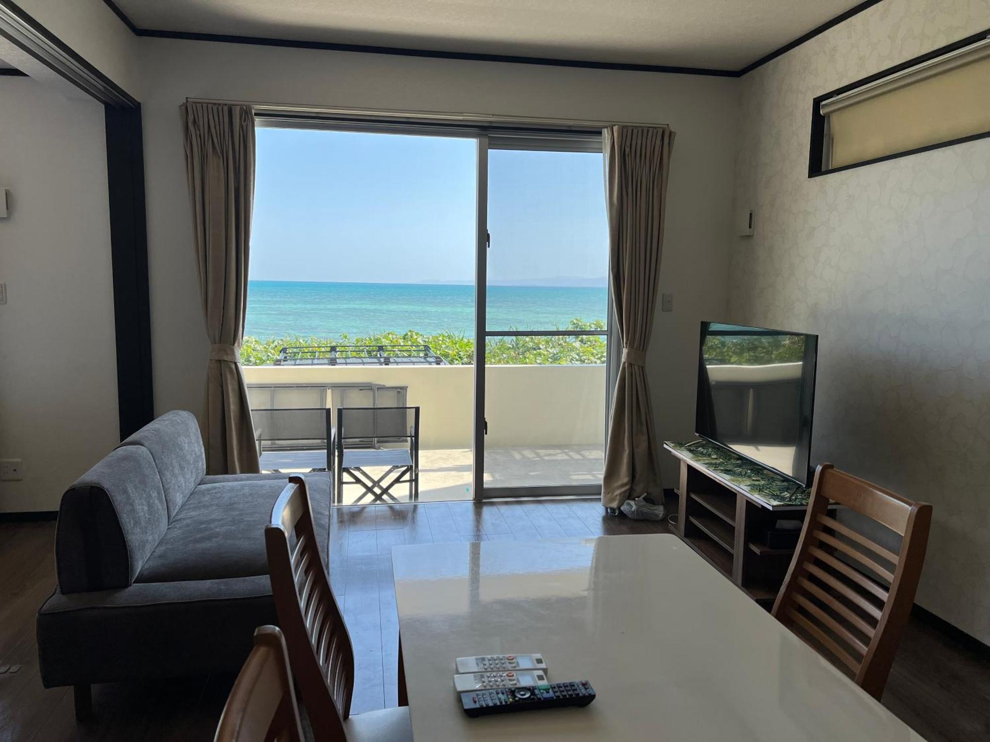 Ocean Front Sumuide Apartment Nago Bagian luar foto