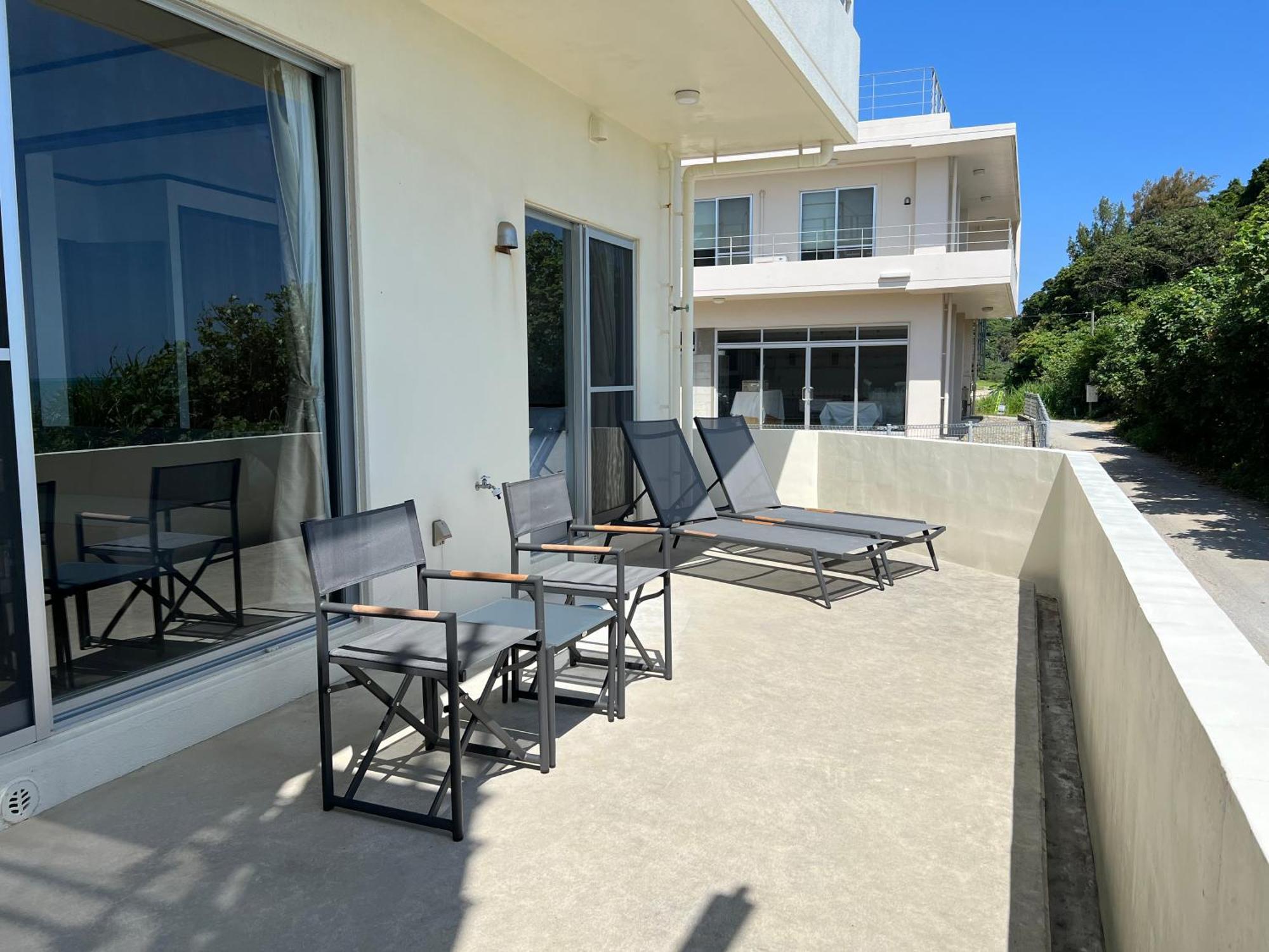 Ocean Front Sumuide Apartment Nago Bagian luar foto