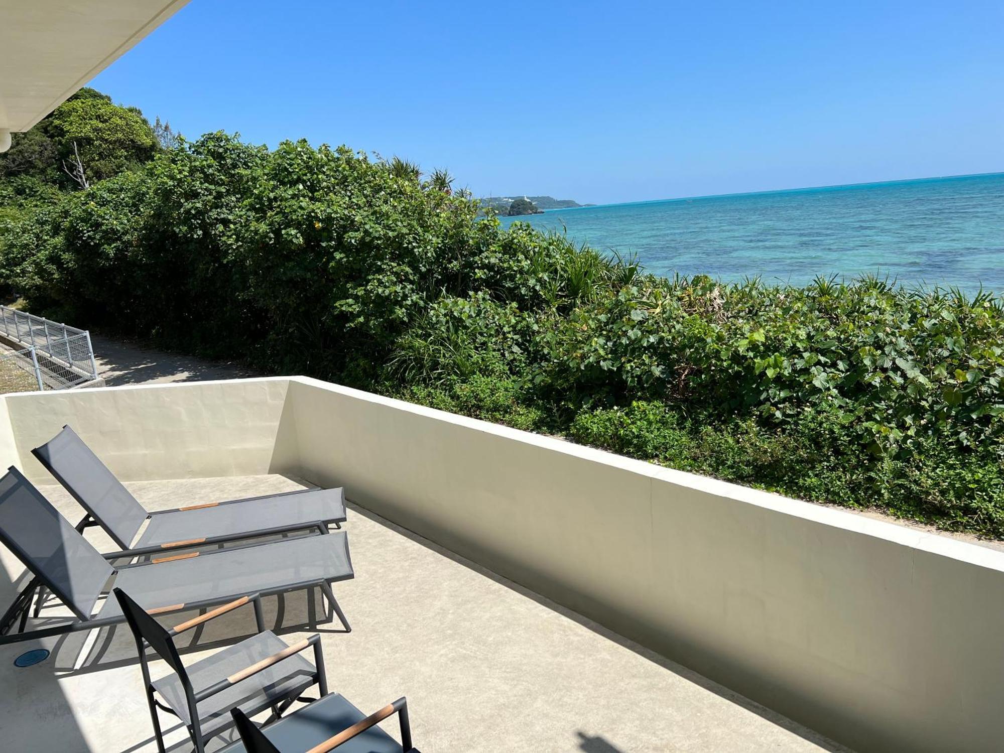 Ocean Front Sumuide Apartment Nago Bagian luar foto