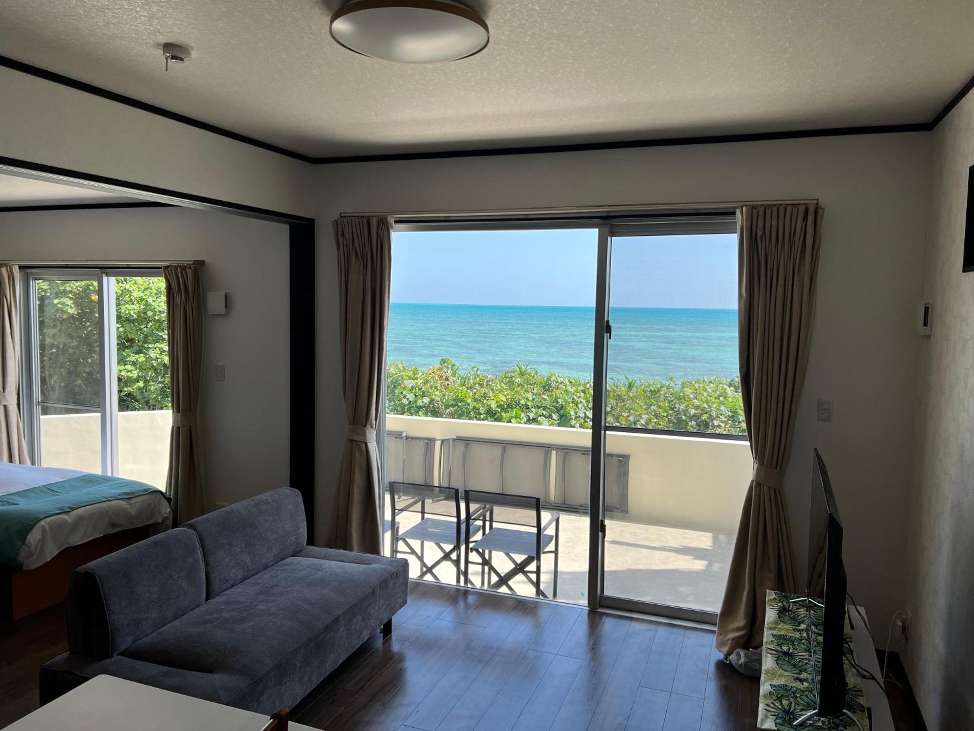 Ocean Front Sumuide Apartment Nago Bagian luar foto