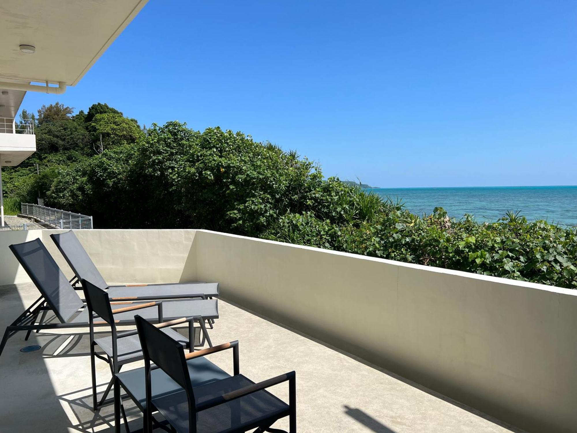 Ocean Front Sumuide Apartment Nago Bagian luar foto