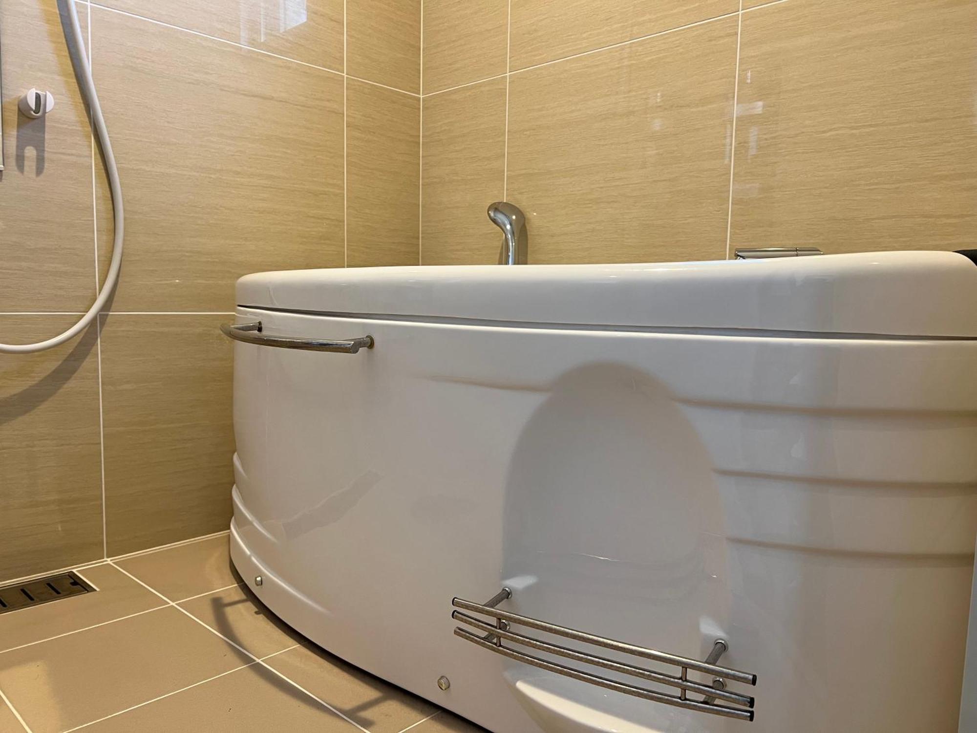 Ocean Front Sumuide Apartment Nago Bagian luar foto